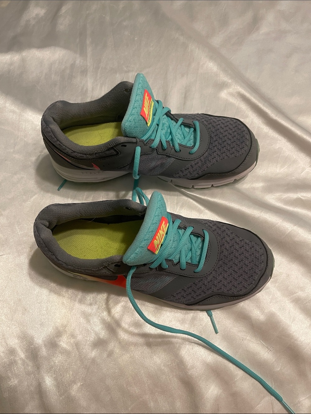 Nike Kids Gray Sneakers with Teal Laces and Teal Tongue